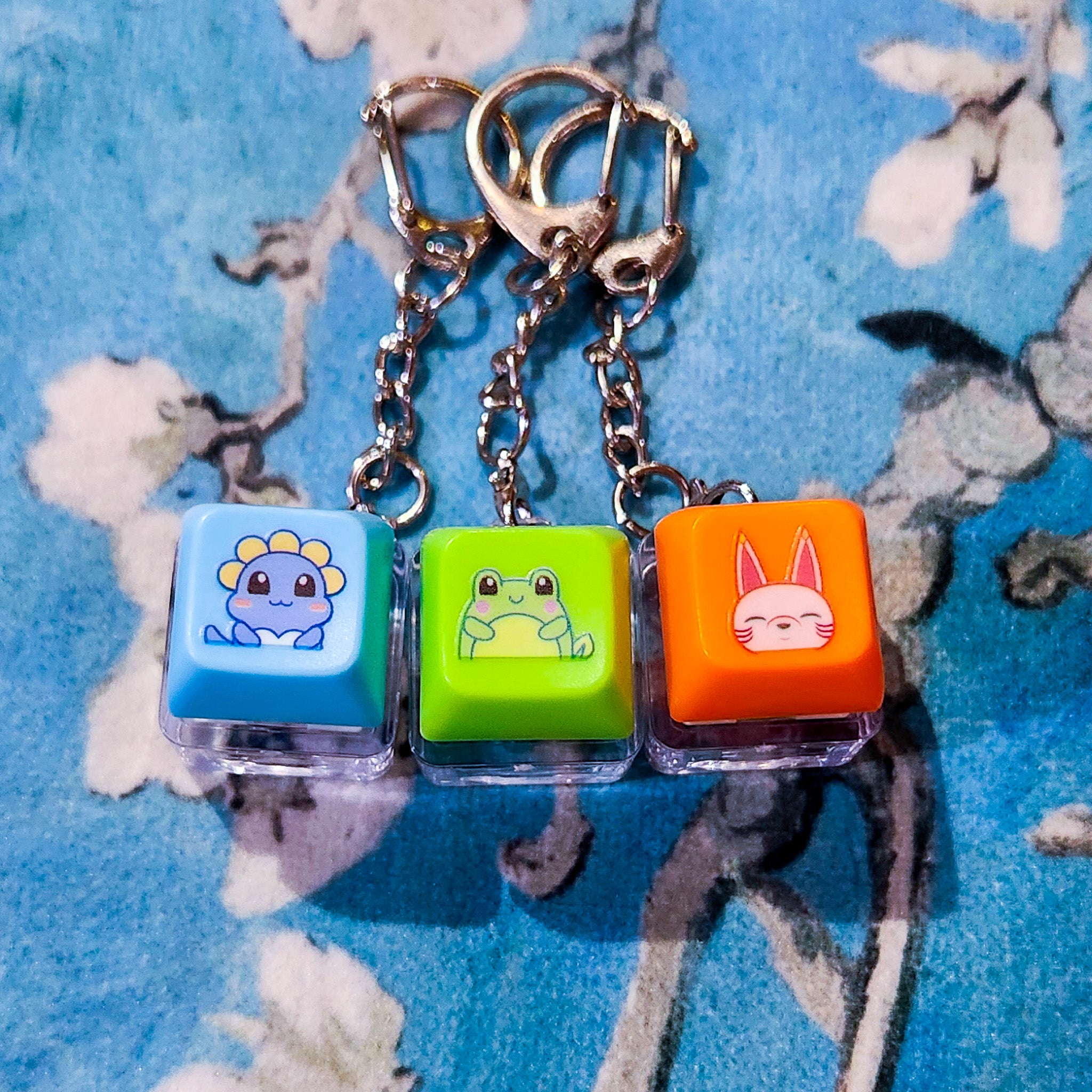 Keychain: Press on Keycaps – Nawu by Naro